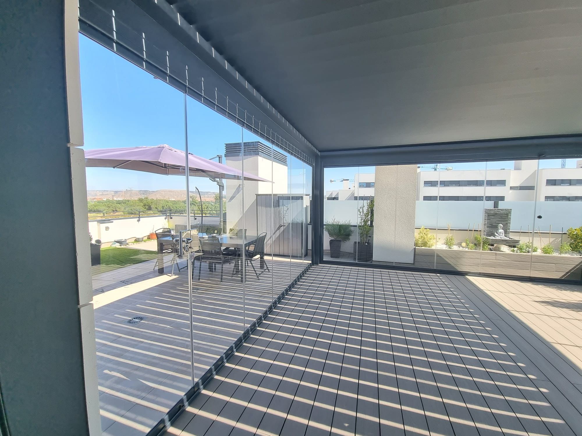 Cortinas de cristal en ático con terraza panorámica